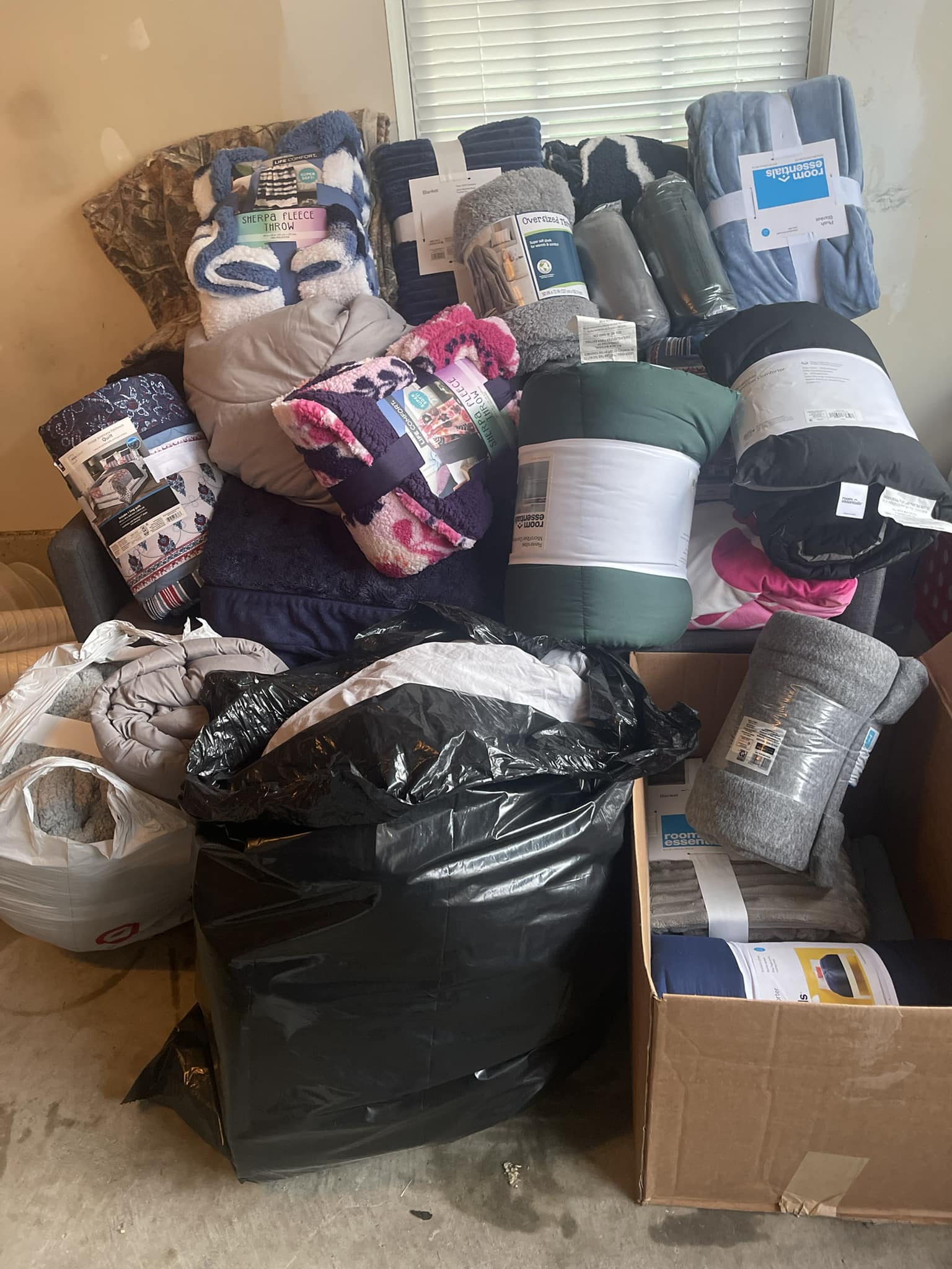 Some of the blankets collected from the Blankets for Bites blanket drive.
